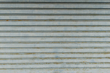 Rusty metal roller shutter garage door texture