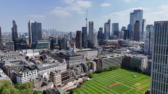 City skyscrapers Panning drone aerial HAC Grounds London cricket pitch event space