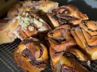 Warm, gooey cinnamon rolls and rich chocolate swirls, perfect for breakfast or a sweet treat.