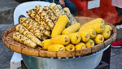 Freshly Grilled Corn on Cob in Traditional Street Tray