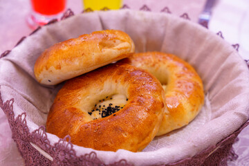 Three round breads in a basket