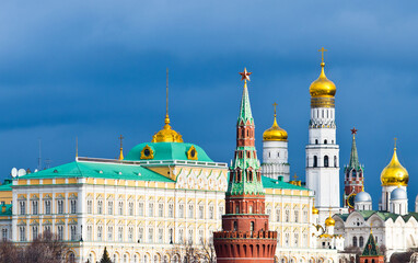 Moscow Kremlin view in winter day. Black clouds and sun light. Moscow. Russia