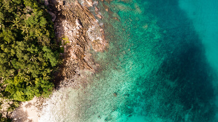 Top view waves crashing on rocks seascape background,Wide angle sea nature background