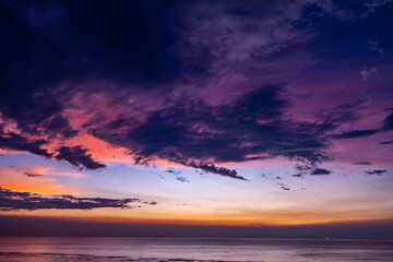 Aerial view sunset sky,Nature beautiful light sunset or sunrise over sea surface,Colorful sunset sky with clouds and waves in the ocean,Wide angle sea background