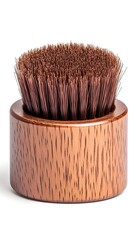 A small, round, brown brush with natural bristles set in a wooden base