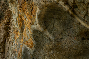 Texture wall rock sea shore for abstract background.