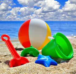 Baby Toys on the beach sand