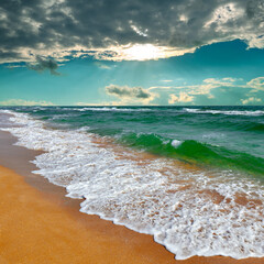 Picturesque view of tropical sunset over turquoise sea