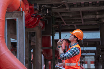 Engineer under checking the industry cooling tower air conditioner is water cooling tower air...