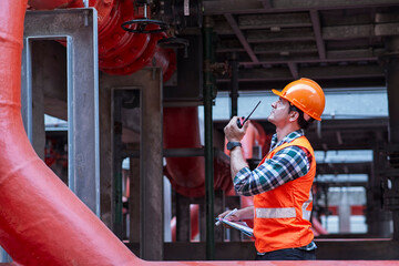 Engineer under checking the industry cooling tower air conditioner is water cooling tower air...