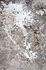 Concrete and cement stains on ground. Abstract messy construction background