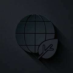 Paper cut Earth globe and leaf icon isolated on black background. World or Earth sign. Geometric shapes. Environmental concept. Paper art style. Vector