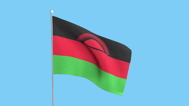 The national flag of Malawi, flying in the blue sky.