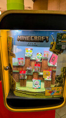 Fototapeta premium Retro arcade treasures encased in pixelated nostalgia, blending Minecraft magic with whimsical gaming memorabilia, ideal for Geek Pride Day April 30th 2025, Belgrade, Serbia