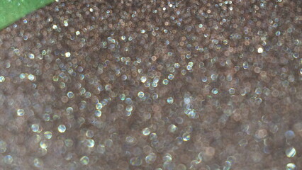 Dark gray silver texture background with a brushed metal effect, featuring a rough, grungy grain texture. It resembles stainless steel, perfect for a sleek, industrial look.