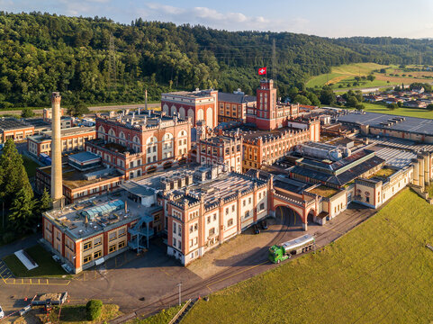 Rheinfelden, Switzerland - July 02. 2023: Feldschl&ouml;esschen Brewery, the largest beverage producer in Switzerland. It was built in 1876 in castle style, an popular industrial architecture at the time.