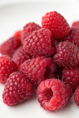 raspberries on a white background