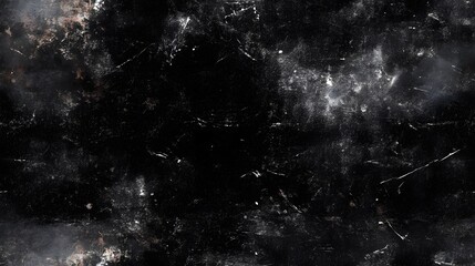 Abstract dark surface texture with various marks.