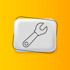 Black Wrench spanner icon isolated on yellow background. Silver rectangle button. Vector