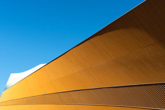 Oodi Library Facade with Clear Blue Sky in Helsinki
Modern architecture of Helsinki Central Library Oodi against a vibrant blue sky, showcasing Finland&rsquo;s blend of innovation a