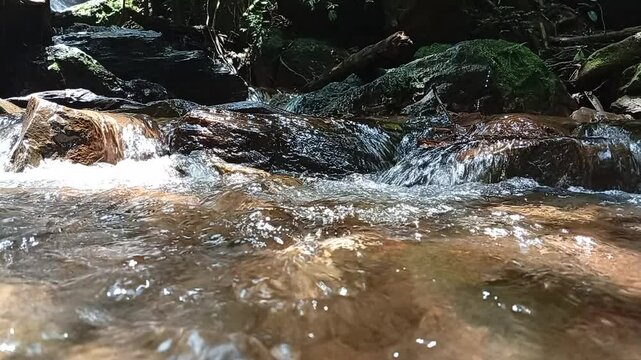water flowing over rocks