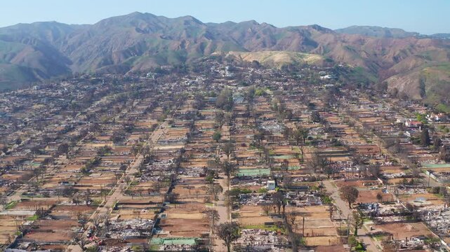 Aerial view of Pacific Palisades Los Angeles post fire homes streets roads 09