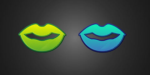 Green and blue Smiling lips icon isolated on black background. Smile symbol. Vector
