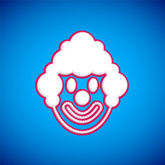 White Clown head icon isolated on blue background. Vector