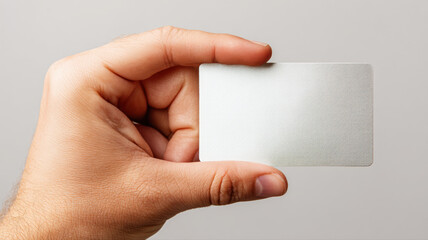 Obraz premium Close-up of fingers with blank card — a detailed and modern 3D-style concept ideal for tech visuals, infographics, marketing materials, and futuristic digital presentations.