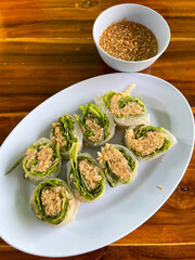 Fresh vegetable noodle spring roll with spicy sauce, thai style.