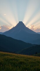 Fototapeta premium Mountain Peak with Sun Rays at Sunset
