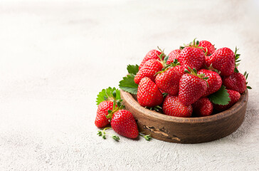 Sweet stawberry in wooden plate