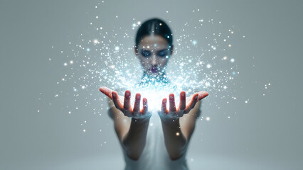 Centered person in clean white studio background holding glowing magical light particles in hands, creating mystical and bright effect
