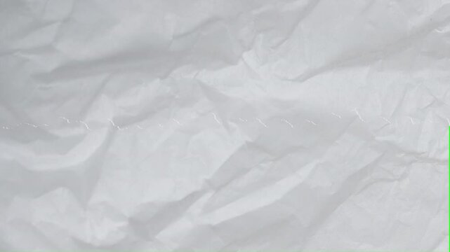 Paper Tear Animation open on a green screen, creating a transition with a key color