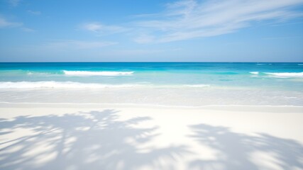 Fototapeta premium Seaside Serenity: A tranquil view of the sea where the pristine sand meets the turquoise sea under a radiant sky. A perfect backdrop for serenity and travel exploration.