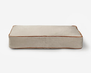 Comfortable pet bed resting on white background featuring brown leather piping