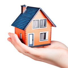 Small detailed model house held in human hand with modern design and blue roof, illustrating real estate, housing, or property concept in a creative way