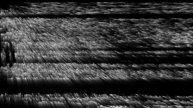 The video features a colored/static-glitch style TV noise background. It&rsquo;s a chaotic digital texture composed of pixels primarily vibrant randomly distributed across the frame