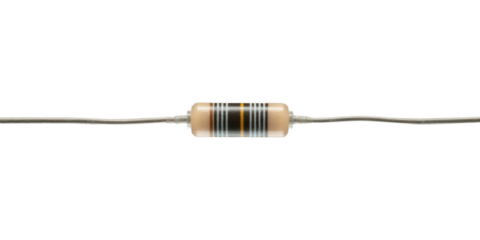 Close-up of a beige axial leaded resistor with black and orange stripes on a black background