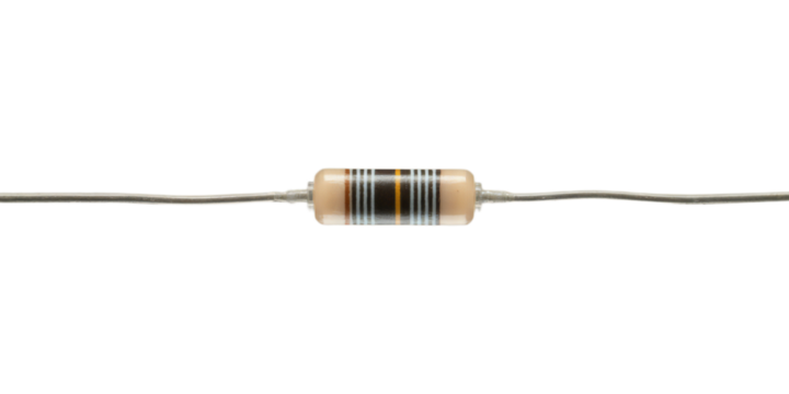 Close-up of a beige axial leaded resistor with black and orange stripes on a black background