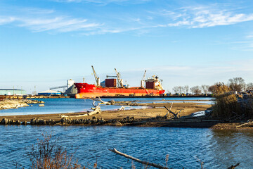 Large Cargo Ship Docked at Industrial Harbor Port