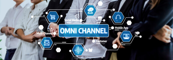 A diverse team of professionals in a modern office setting presents an omni channel strategy,...