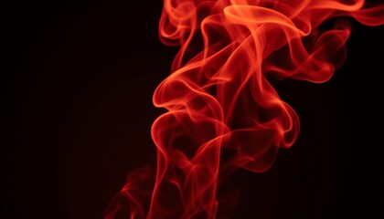 Obraz premium Vibrant red smoke swirling against black background.