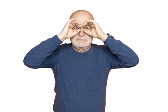 a man with fingers around his eyes