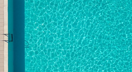 Swimming Pool Aerial View with Clear Turquoise Water and Ladder