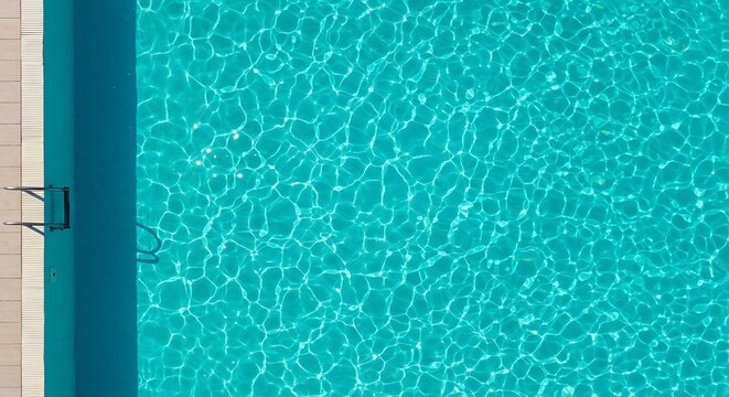 Swimming Pool Aerial View with Clear Turquoise Water and Ladder