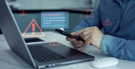 Person holding phone with scam message on digital screen.Bank fraud through phone messages.Fake...