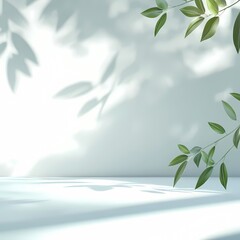Sunlit leaves casting soft shadows on a serene white wall creating a tranquil natural ambiance