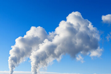 Industrial efficiency measures enhancing productivity in a factory setting with visible emissions in clear blue skies