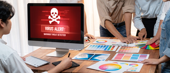 Virus warning alert on computer screen detected brisk cyber threat , hacker, computer virus and...